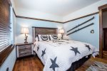 Cowboy bedroom has a Queen-size bed and closet space for your things 
